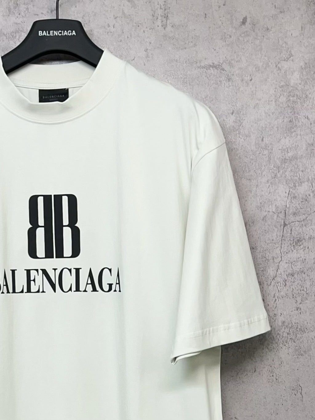 White Balenciaga logo T-shirt, crew neck and short sleeves, side view