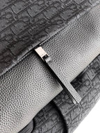 Backpack lining close-up with zipper trim and stitched fabric panel