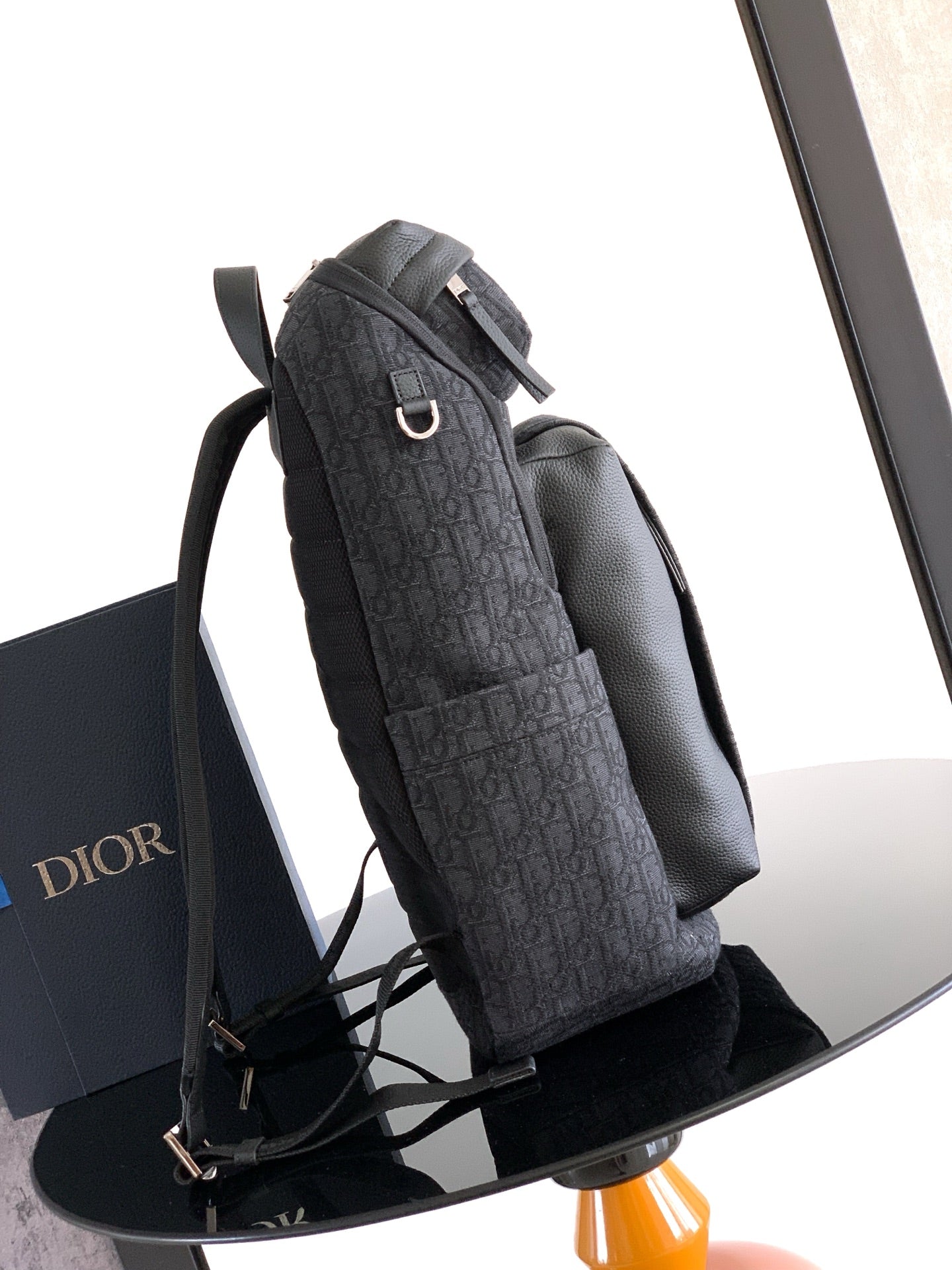 Men's Dior monogram backpack with side pocket and adjustable shoulder strap