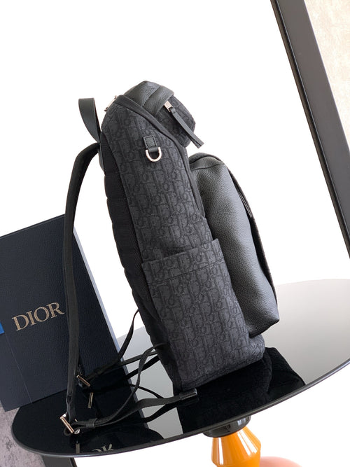 Men's Dior monogram backpack with side pocket and adjustable shoulder strap