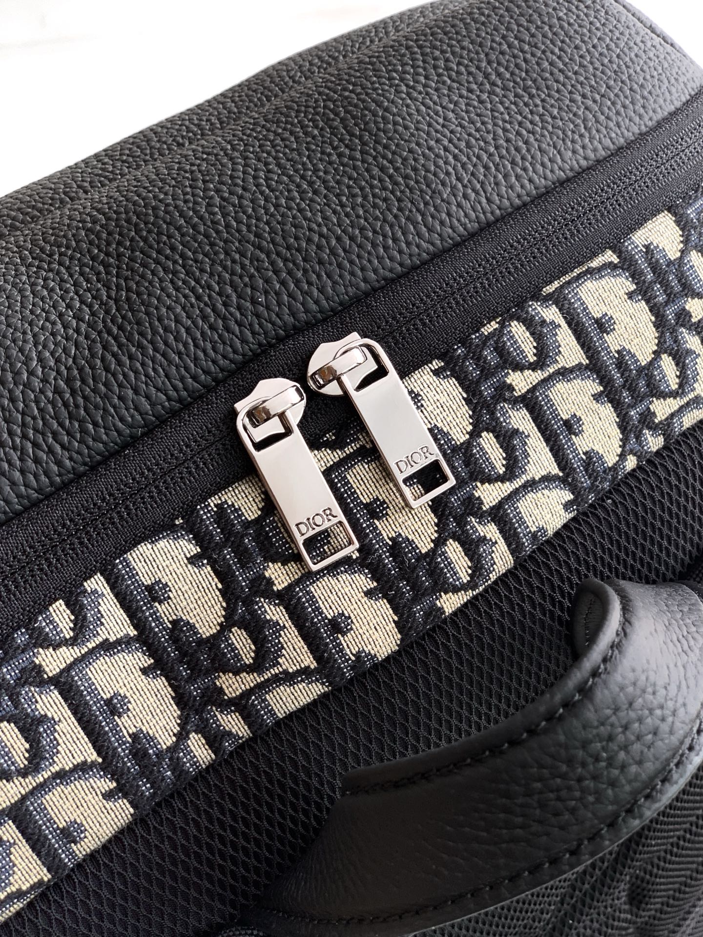 Black leather backpack panel with Dior monogram print and silver-tone zipper pulls