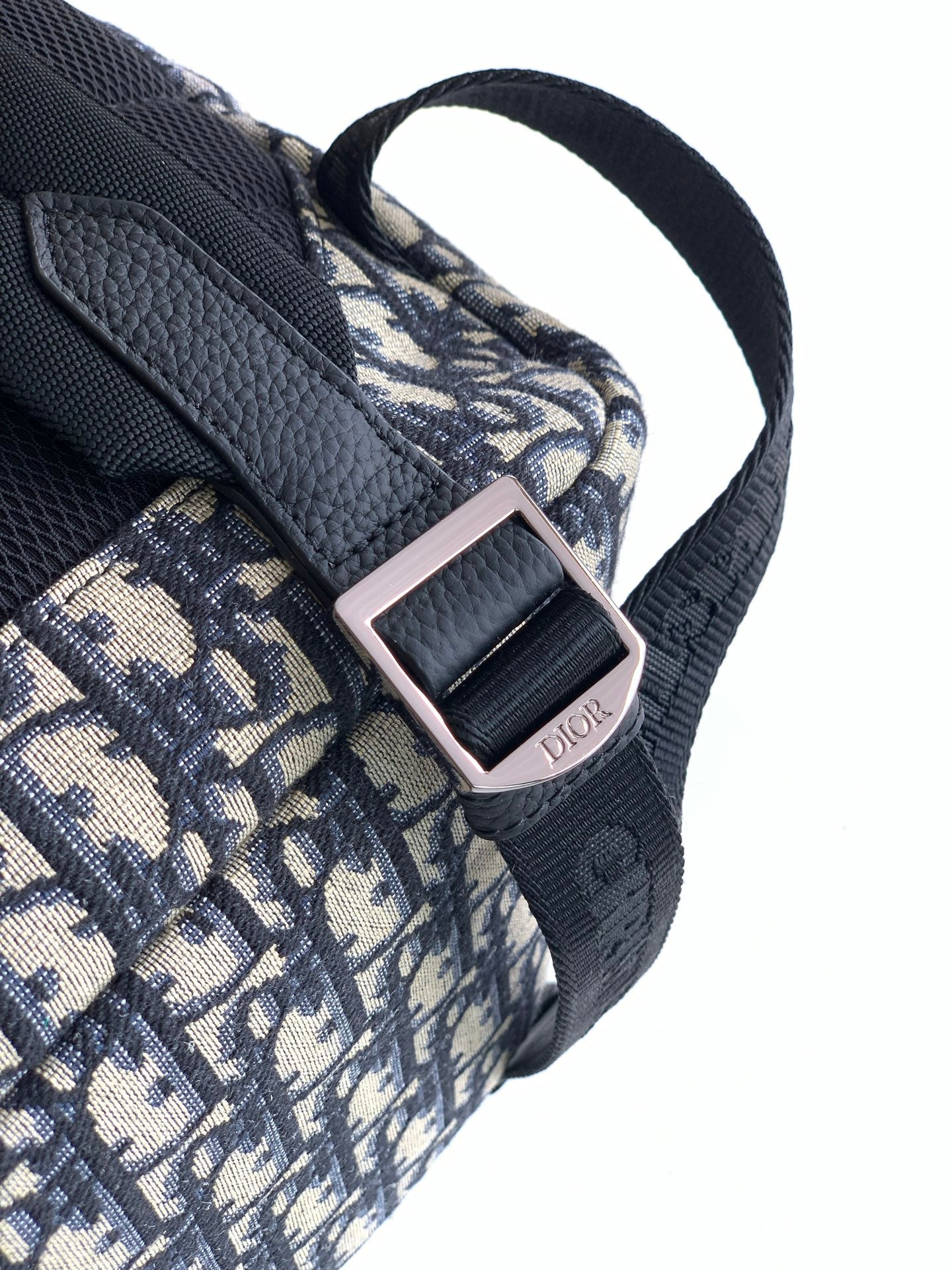 Dior monogram backpack shoulder strap with metal buckle and Dior logo plate