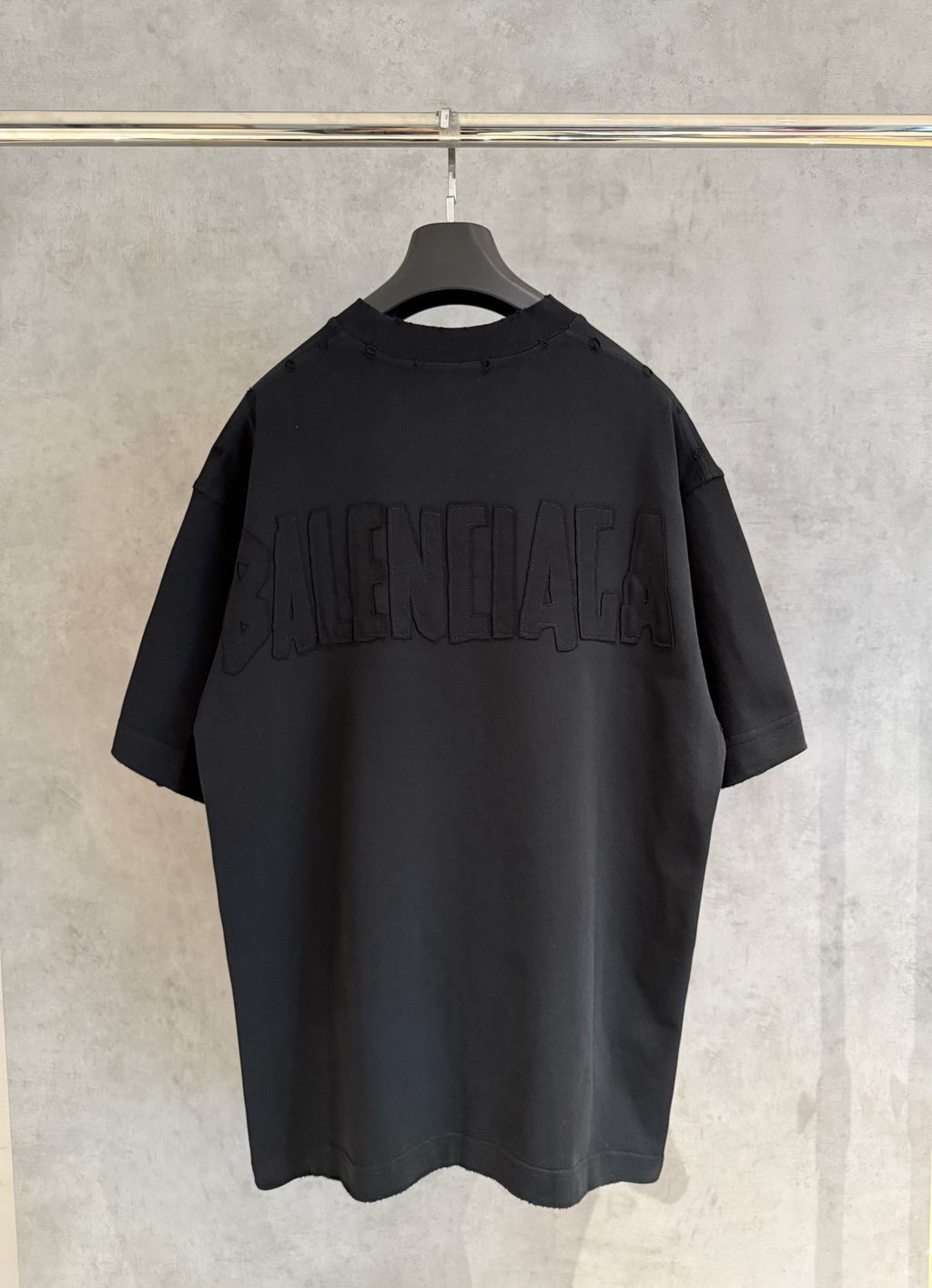 Balenciaga black short-sleeve T-shirt with large raised logo on back