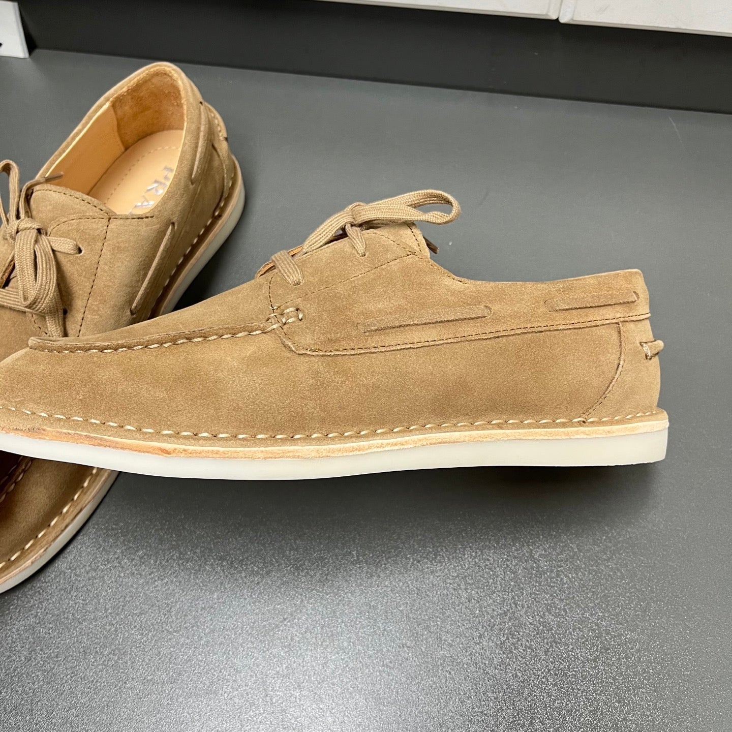 Prada unisex tan suede lace-up shoes, close-up of front and lace ties