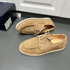 Prada unisex tan suede lace-up shoes, side view with contrast welt stitching