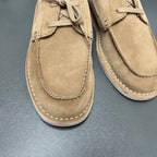 Prada unisex tan suede shoes, close-up of front seam and lace panel