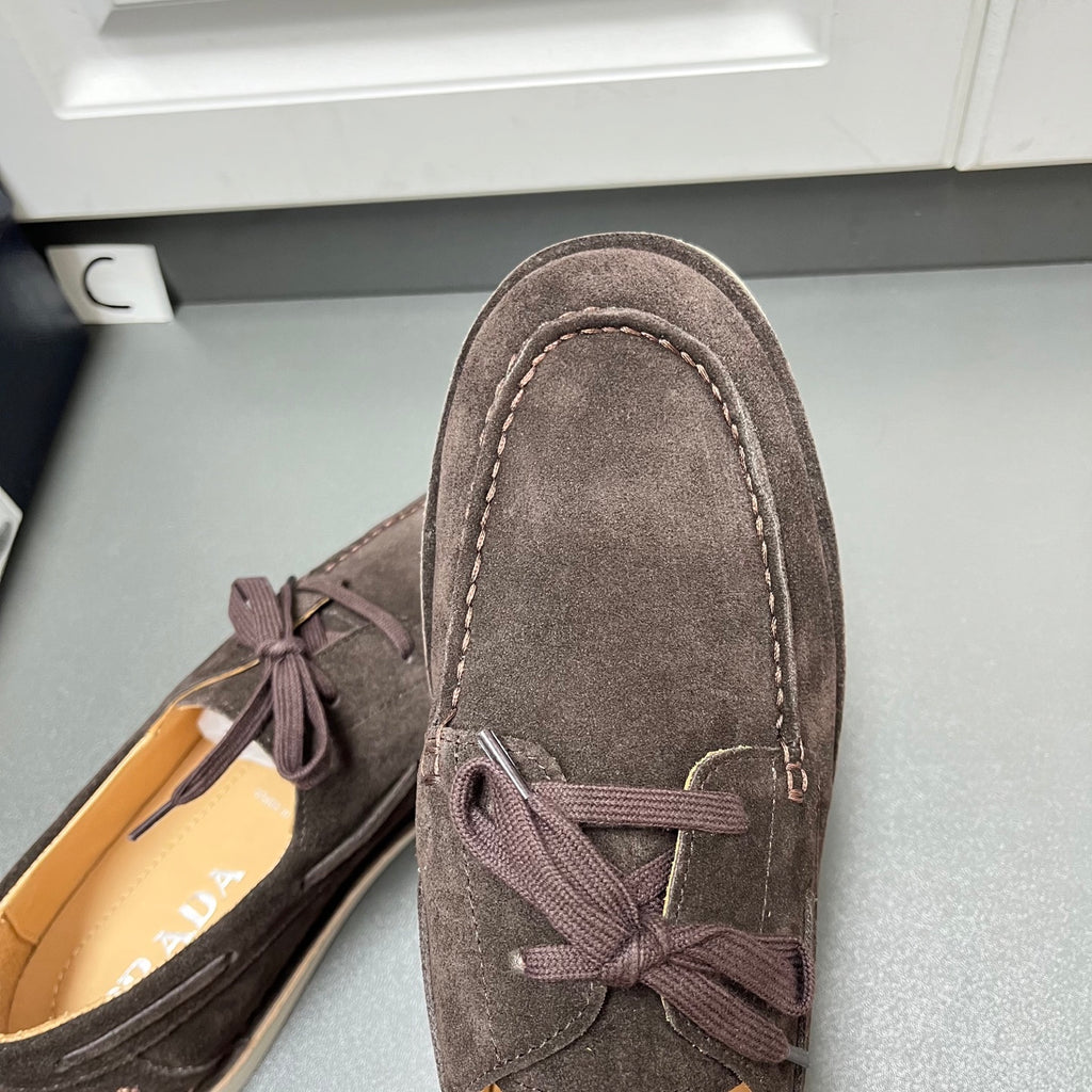 Prada unisex suede shoes, dark brown with lace bow and stitched toe seam