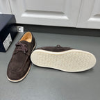 Prada unisex suede shoes, dark brown with lace bow; outsole tread visible