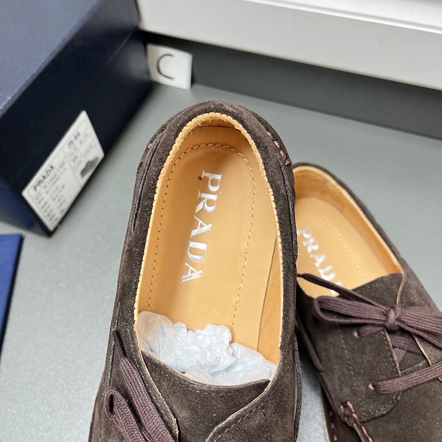 Prada unisex suede shoes, dark brown with lace bow and tan interior lining