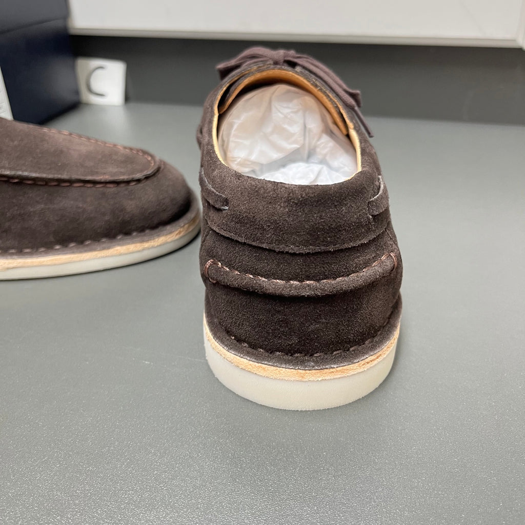 Prada unisex suede shoes, dark brown heel view with lace bow and padded collar