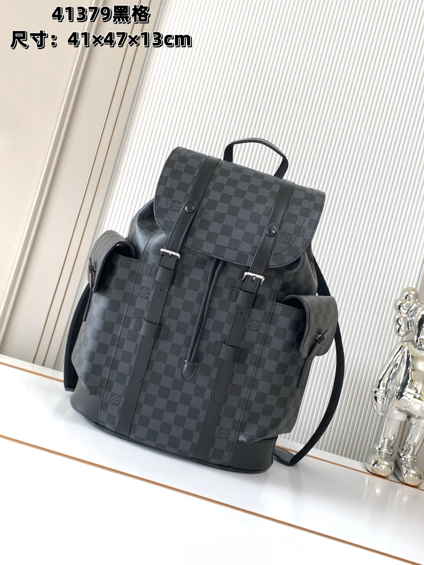 Men's Louis Vuitton checkered bag with top handle, front flap, and shoulder strap