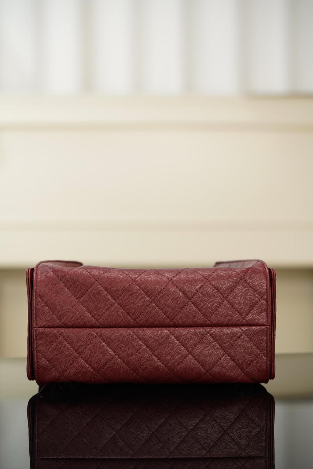 Chanel quilted clutch wallet in dark red with long top flap and stitched chevron pattern