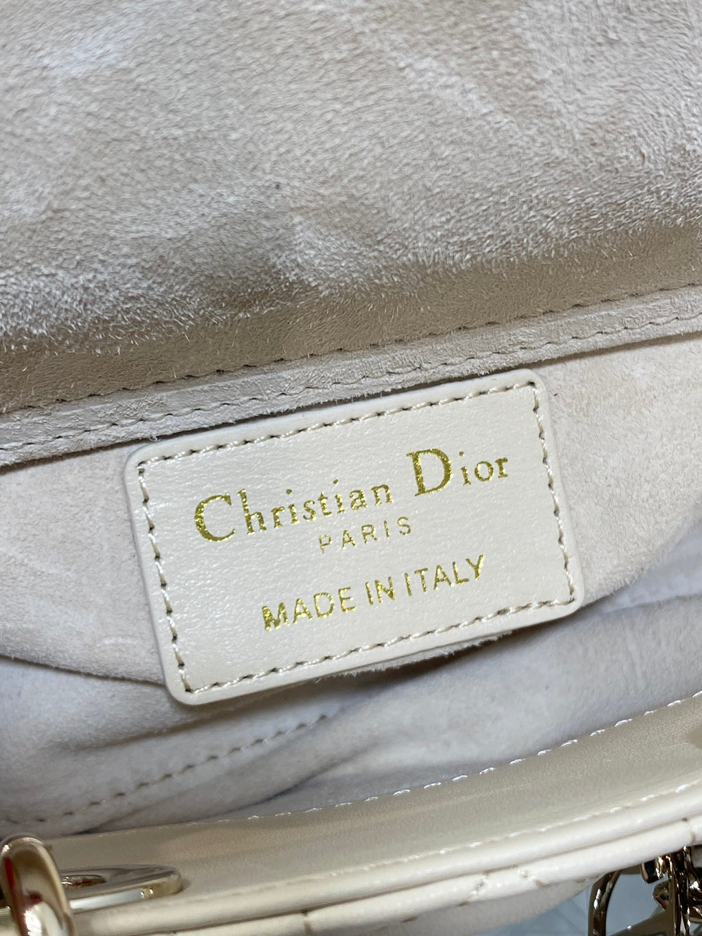 Cream Dior bag logo patch reading Christian Dior PARIS, Made in Italy