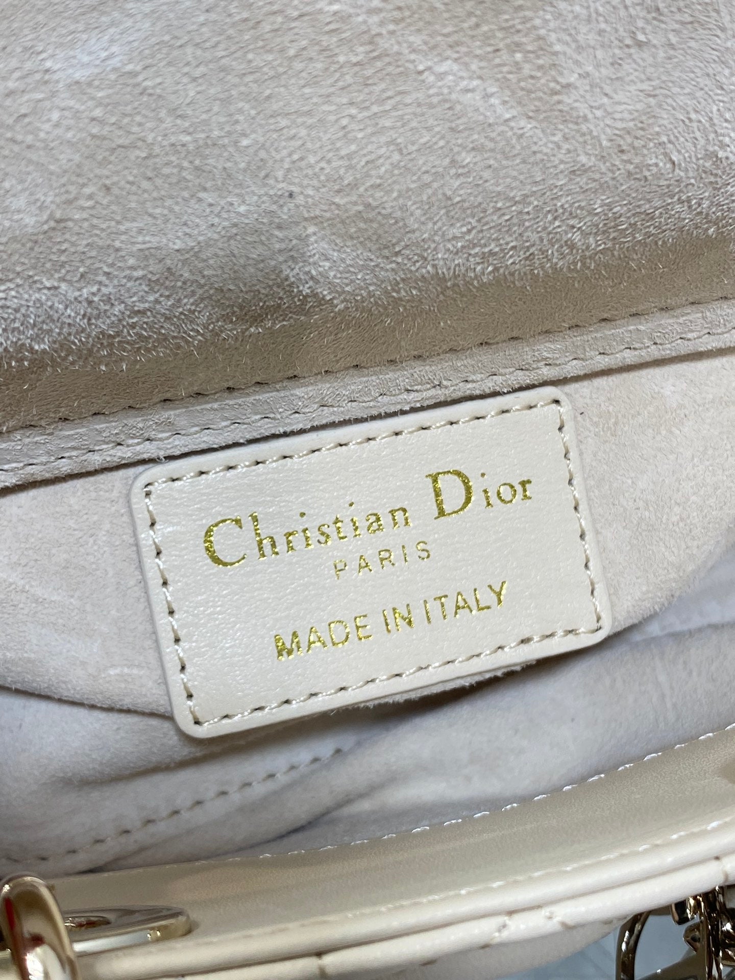 Cream Dior bag logo patch reading Christian Dior PARIS, Made in Italy