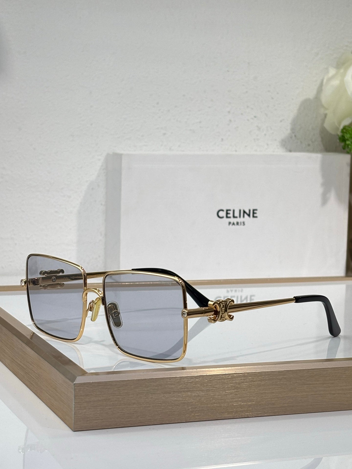 Celine sunglasses with gold frame and light smoke gradient square lenses