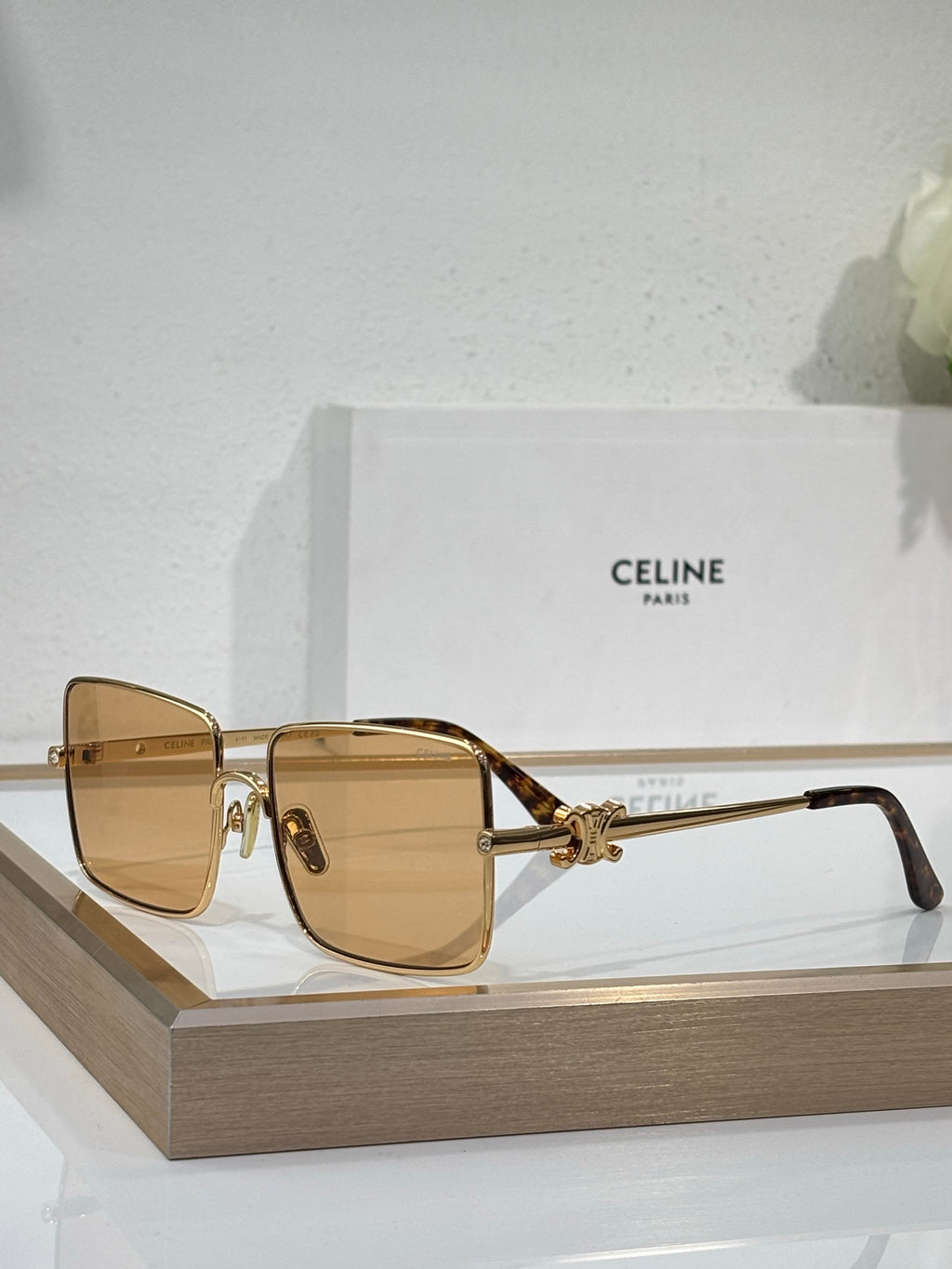 Celine sunglasses with gold frame and amber square lenses