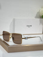 Celine sunglasses with gold frame and warm brown square lenses