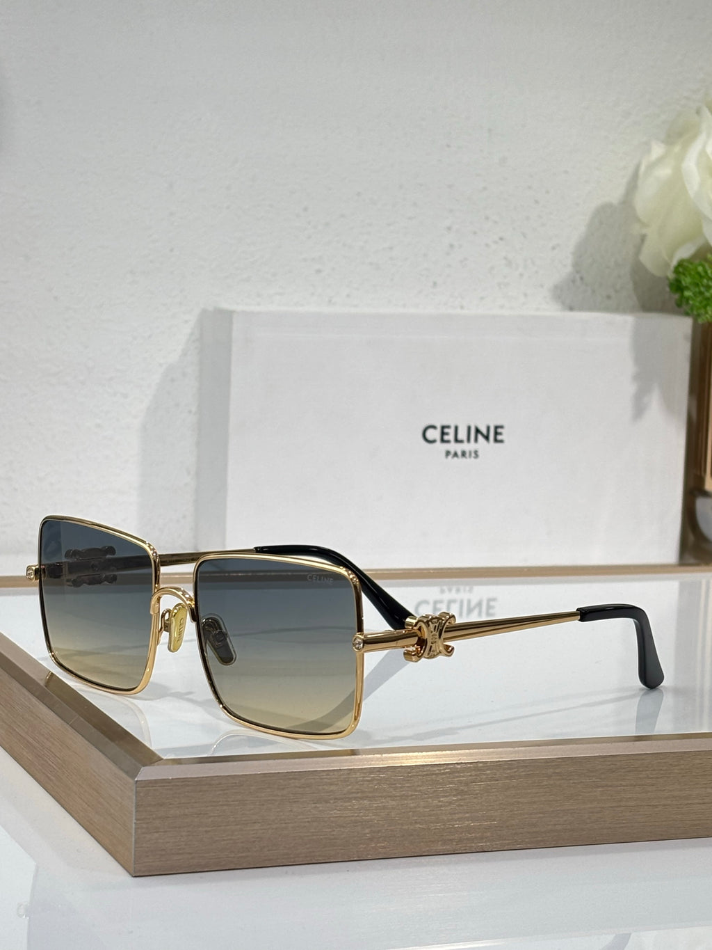 Celine sunglasses with gold frame and dark gradient square lenses