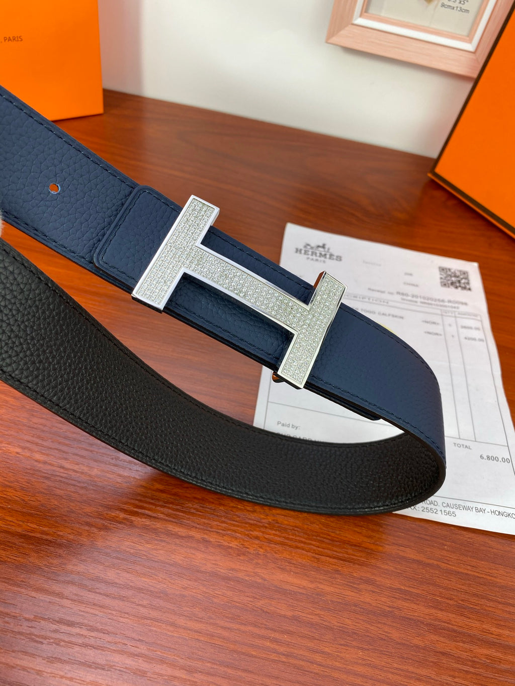 Hermes reversible leather belt with silver H buckle and dark blue strap