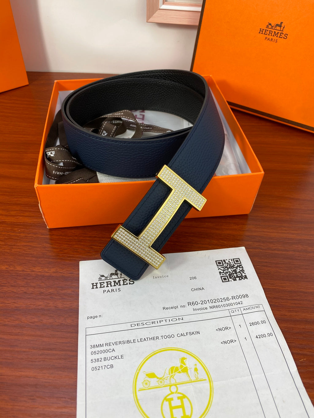 Hermes reversible leather belt with dark blue strap and silver H buckle