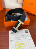 Hermes reversible leather belt with dark blue strap and silver H buckle