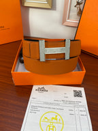Wide leather belt with silver studded H buckle and orange strap