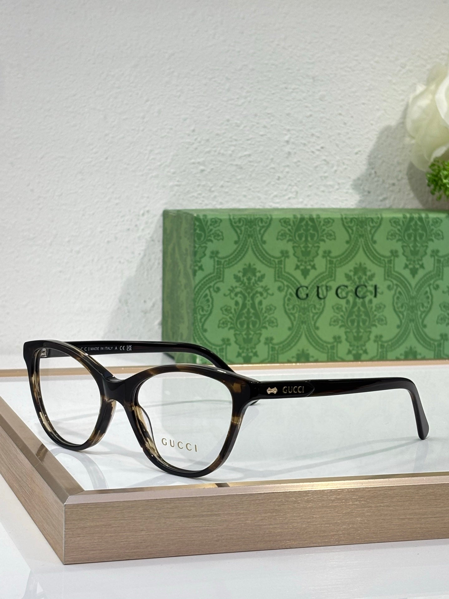 Gucci eyeglasses with black frames and clear lenses with a slim profile