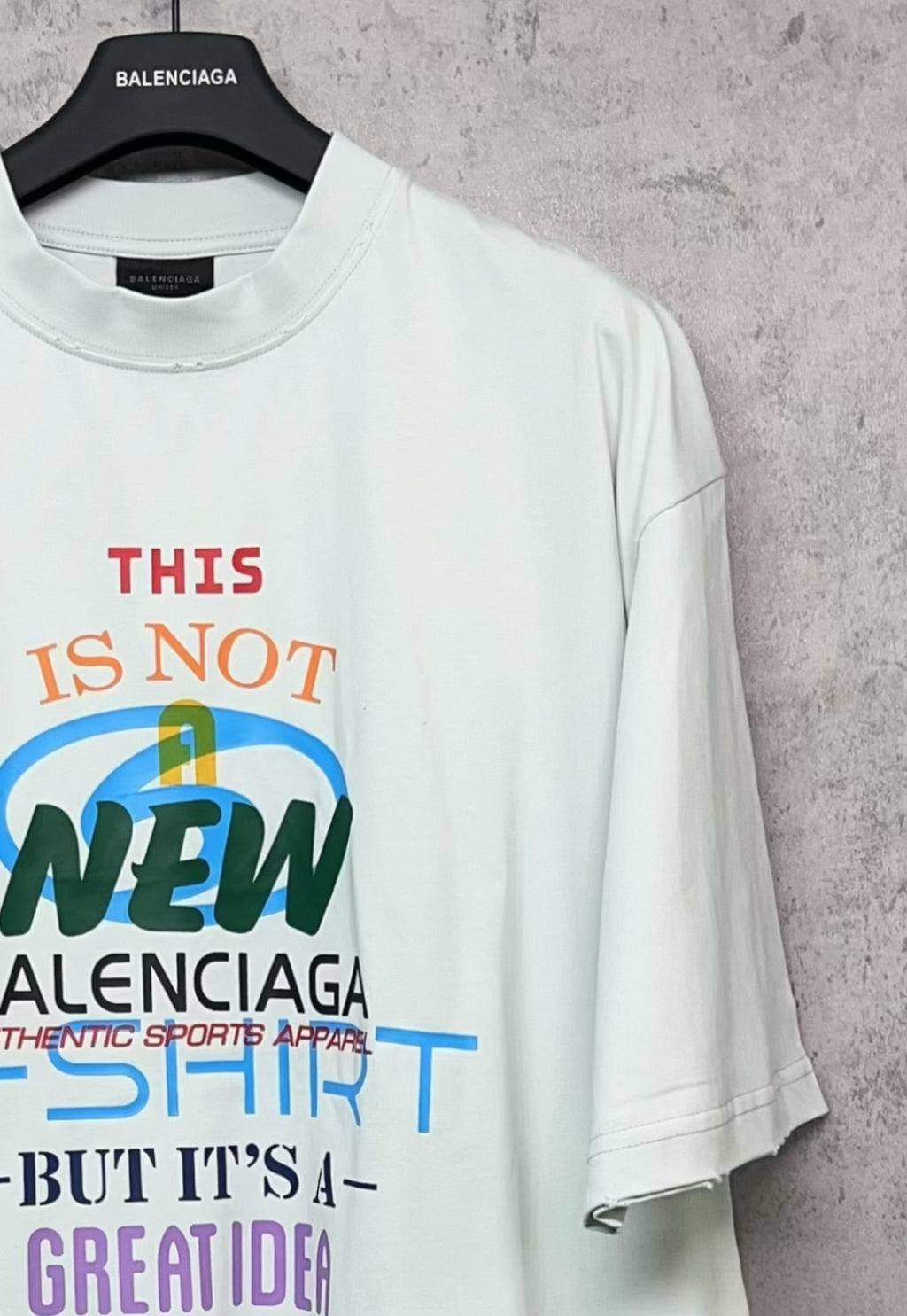 Balenciaga white T-shirt with close-up of front graphic print and logo text