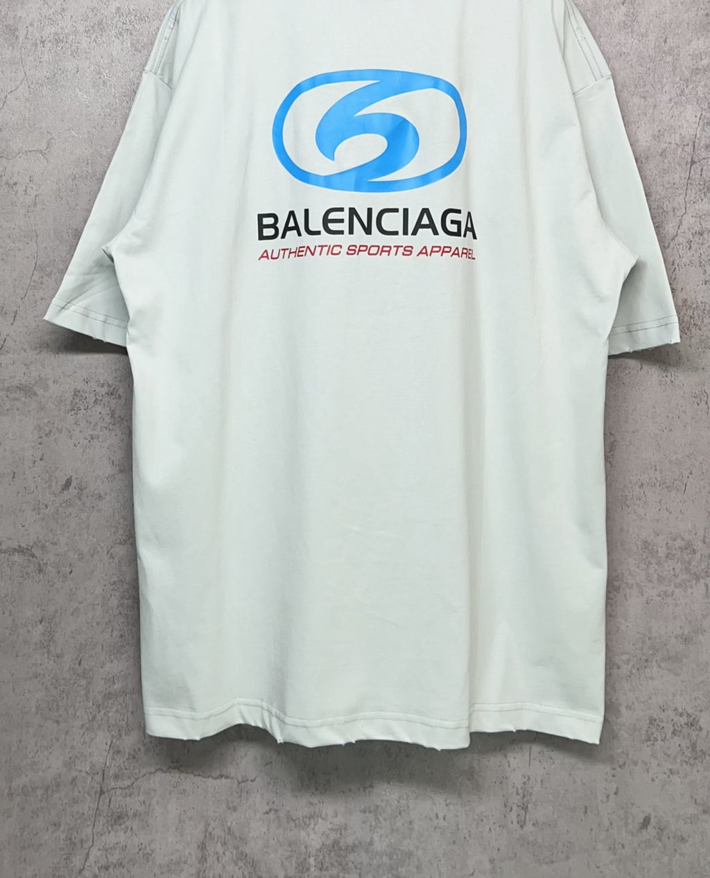 Balenciaga white T-shirt with full back “6” logo and “Authentic sports apparel” text