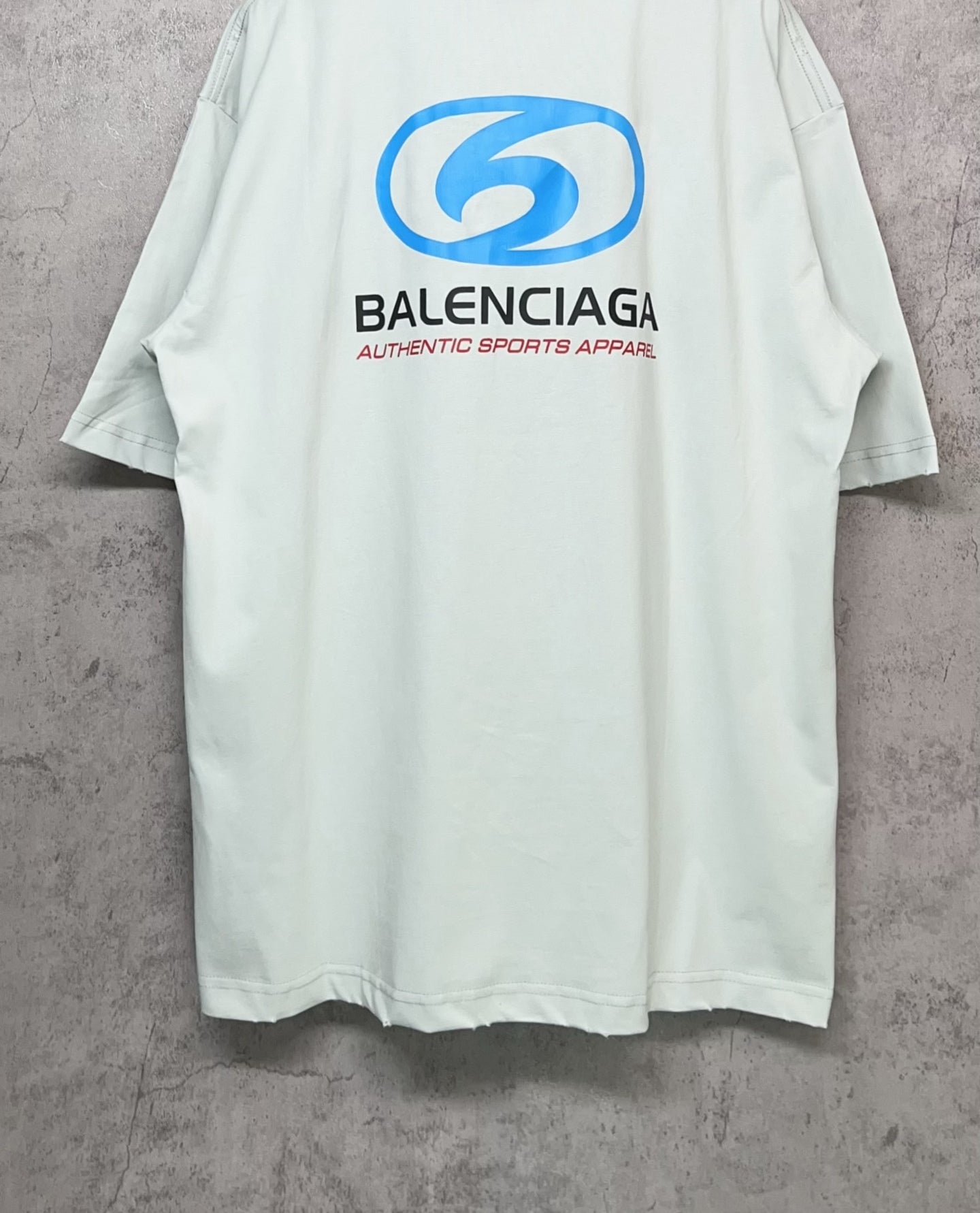 Balenciaga white T-shirt with full back “6” logo and “Authentic sports apparel” text