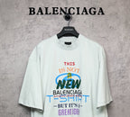 Balenciaga white T-shirt with front “THIS IS NOT NEW” multicolor graphic print