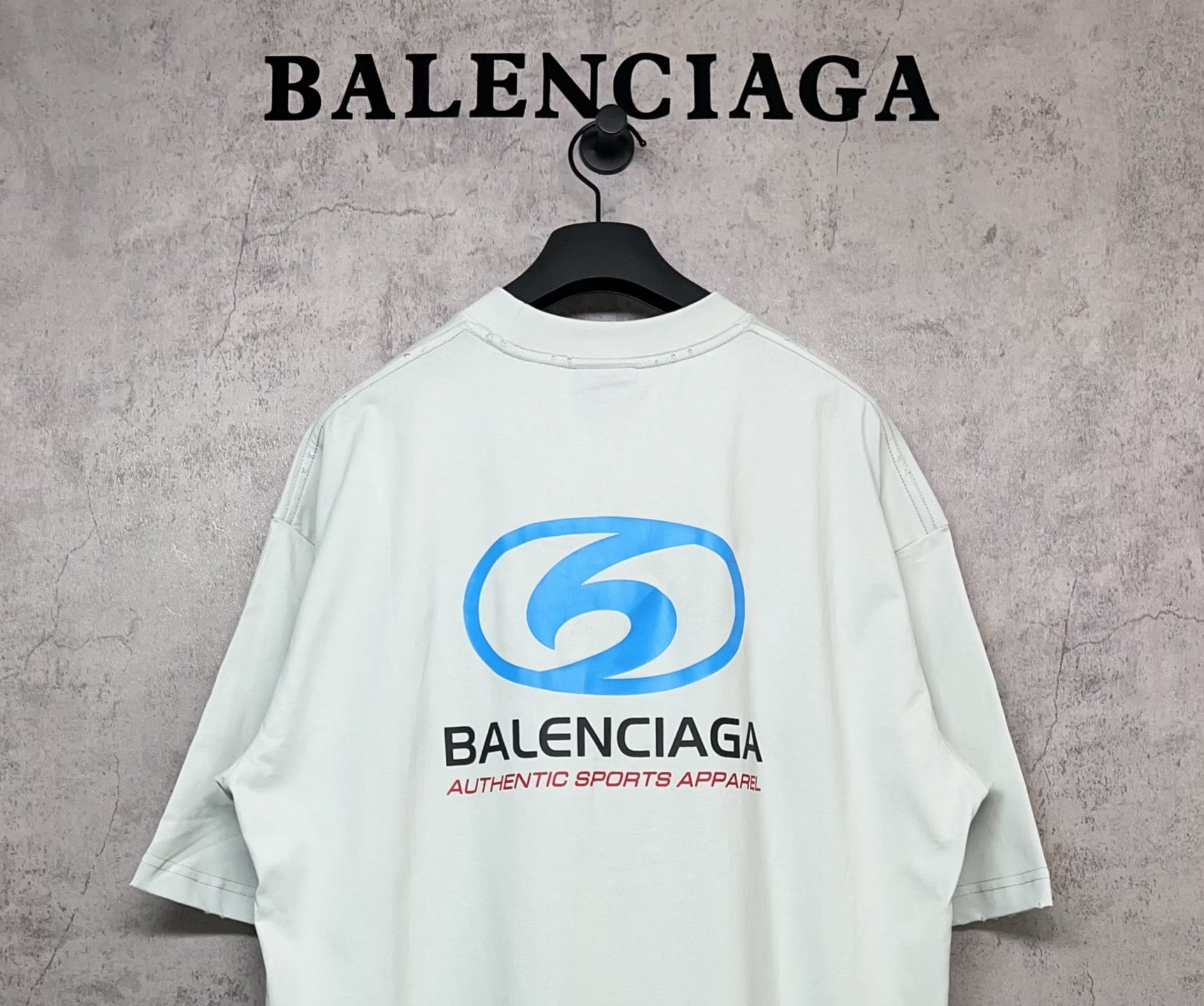 Balenciaga white T-shirt with back “6” logo mark centered