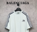 Balenciaga short-sleeve shirt front, white with black stripes and chest logo