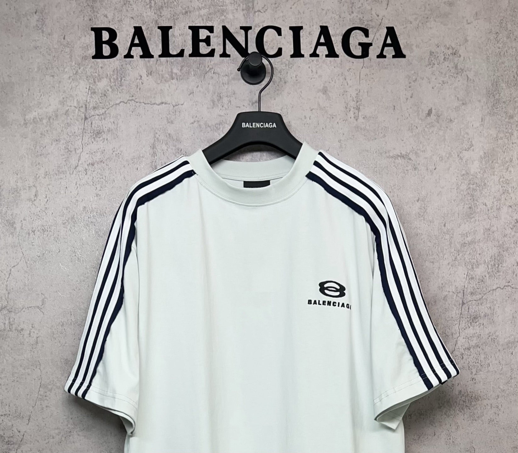 Balenciaga short-sleeve shirt front, white with black stripes and chest logo
