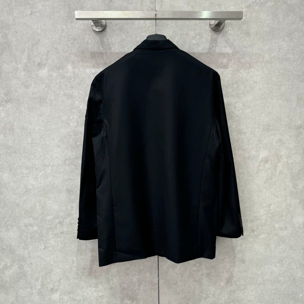 Balenciaga long blazer, dark navy, back view with clean shoulder line