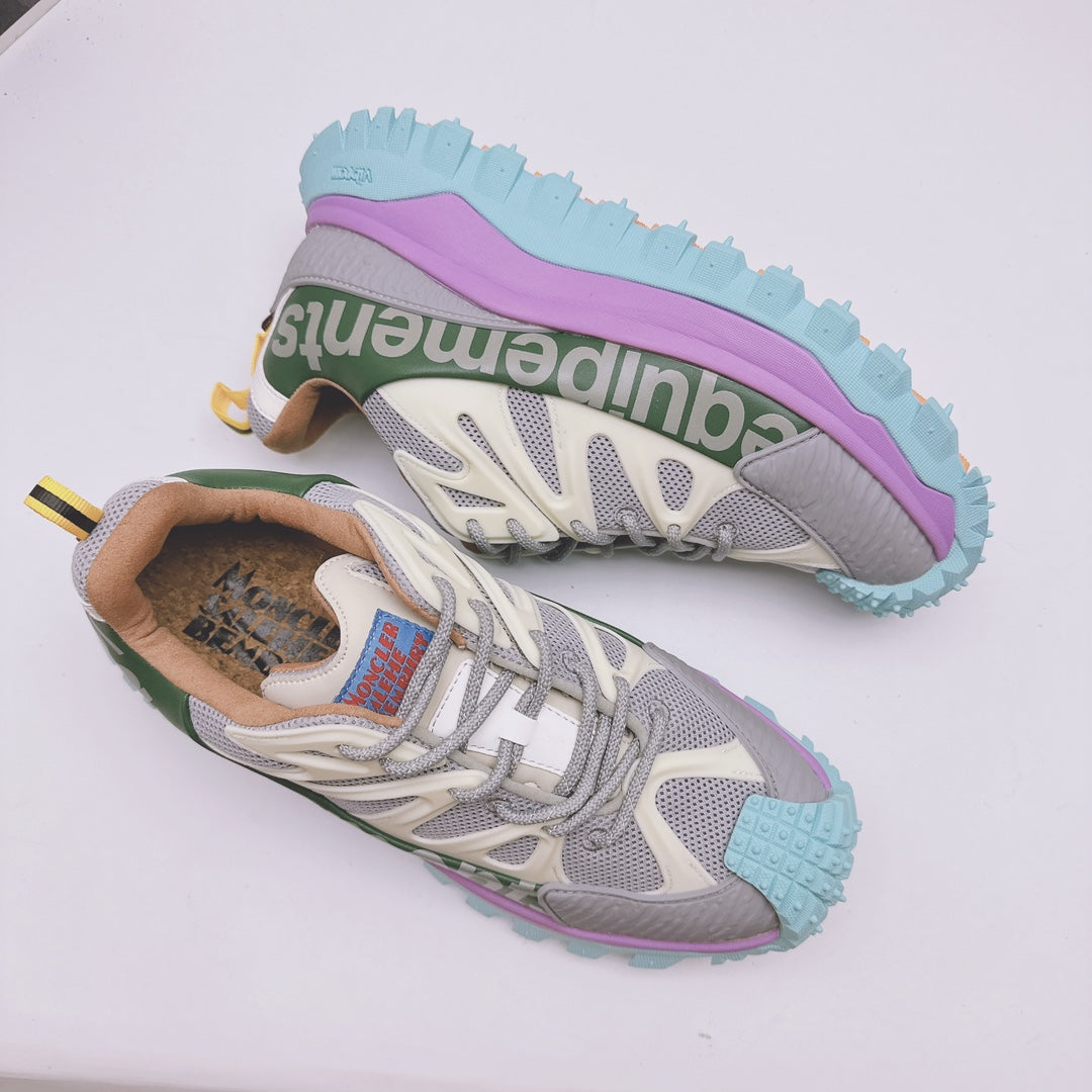 Moncler luxury sneakers, close-up of uppers and outsole with purple and teal platform