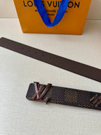 LV belt strap with brown leather back, stud holes, and metal buckle