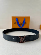 Louis Vuitton belt in dark textured leather with silver-toned LV buckle