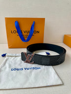 Louis Vuitton belt on pouch with LV buckle and textured dark strap