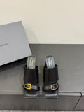 Balenciaga black leather slide sandals with square gold buckle, low block heel