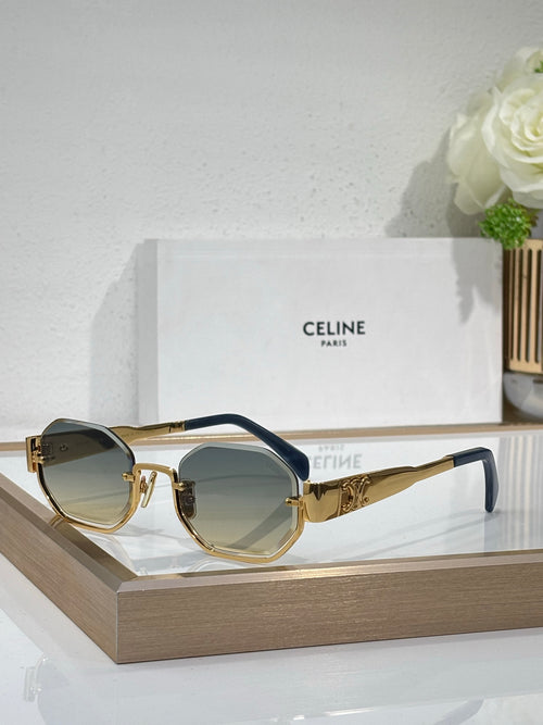 Celine sunglasses with gold-tone frames and blue-tinted lenses