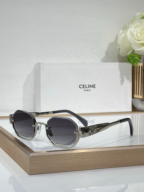 Celine sunglasses with black and silver round-rectangular frames and dark lenses