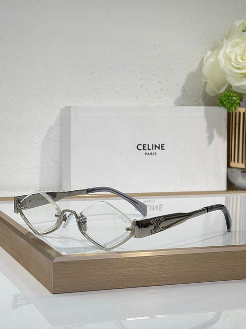 Celine eyeglasses with silver-tone metal frame and clear lenses, slim temples.