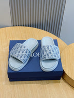 Dior slide sandals, navy Oblique-print straps and light blue sole, pair on box