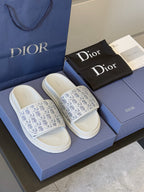 Dior slide sandals on blue box, Oblique-print straps with white footbeds