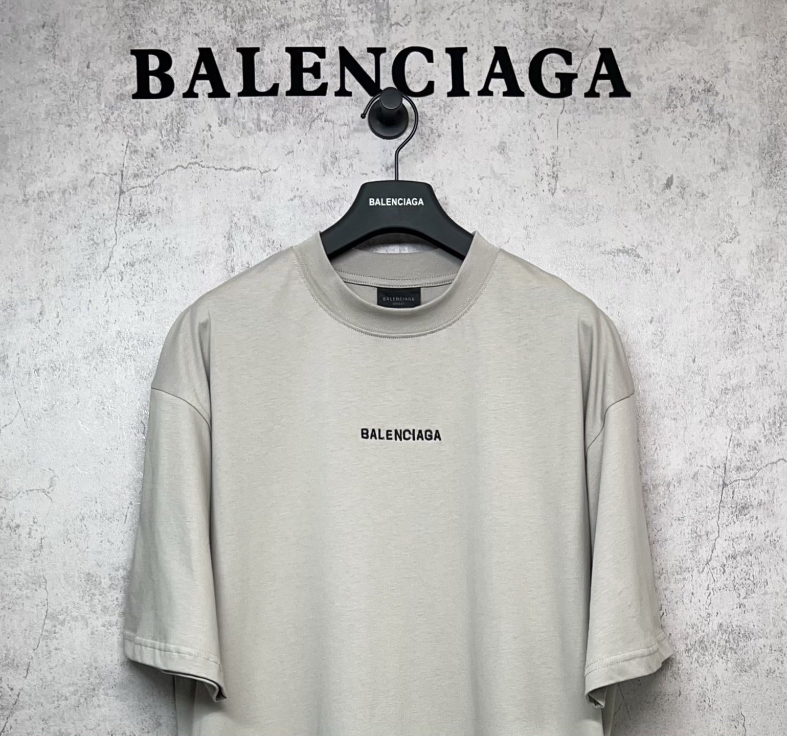 Balenciaga light gray short-sleeve T-shirt front on hanger with chest logo