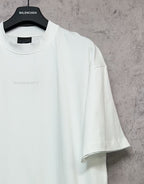 White Balenciaga T-shirt close-up of neckline and right sleeve