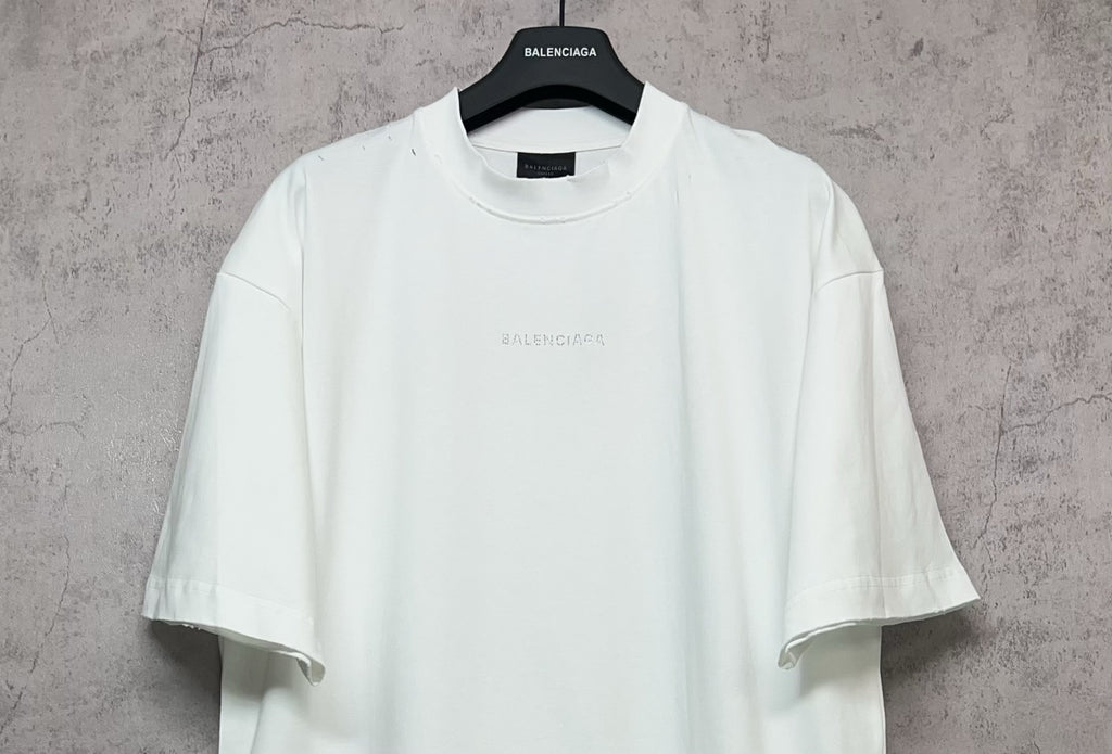 White Balenciaga crew-neck T-shirt with subtle chest print, front