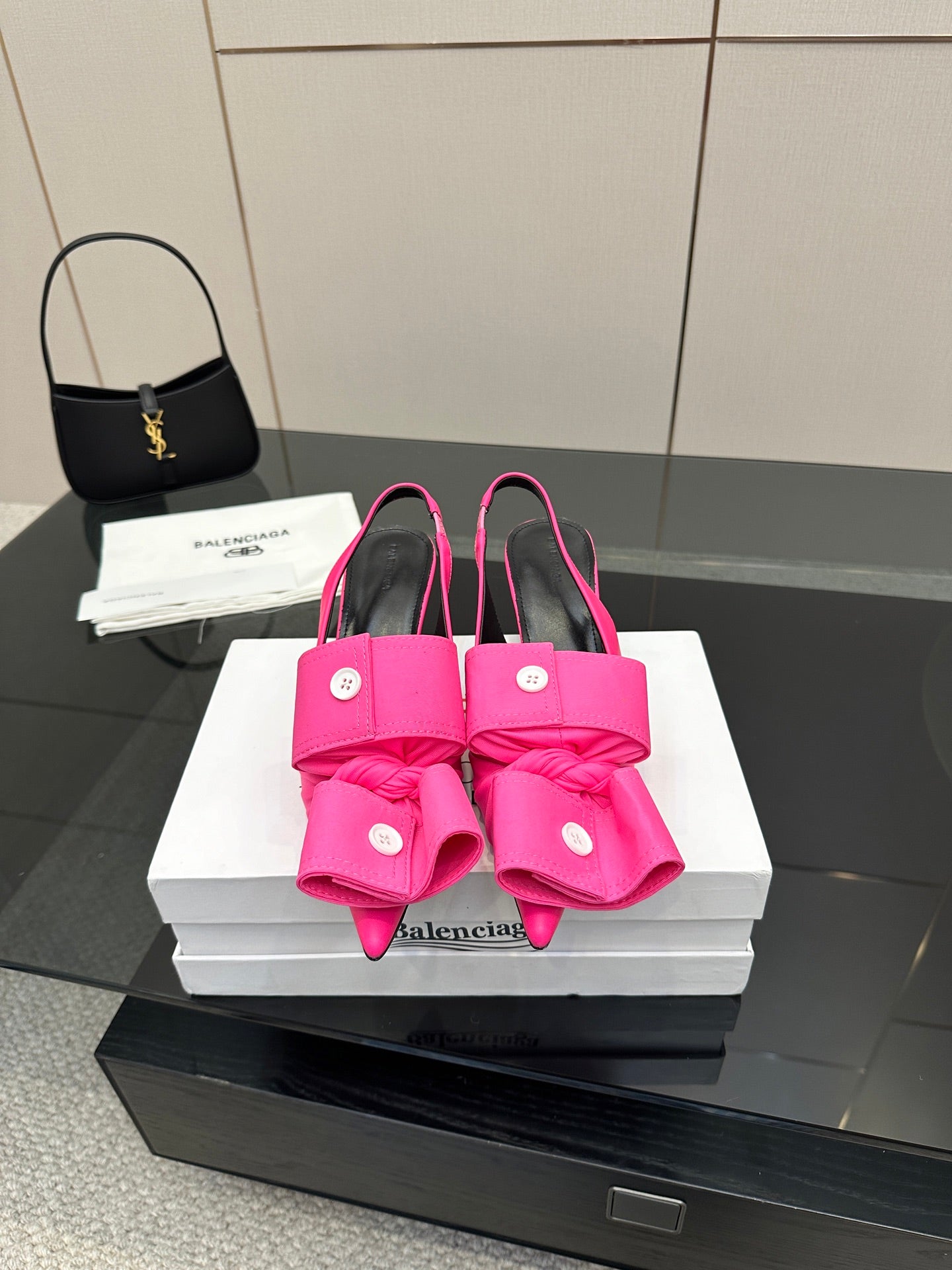 Pink bow mule sandals with stiletto heel and sling-back strap