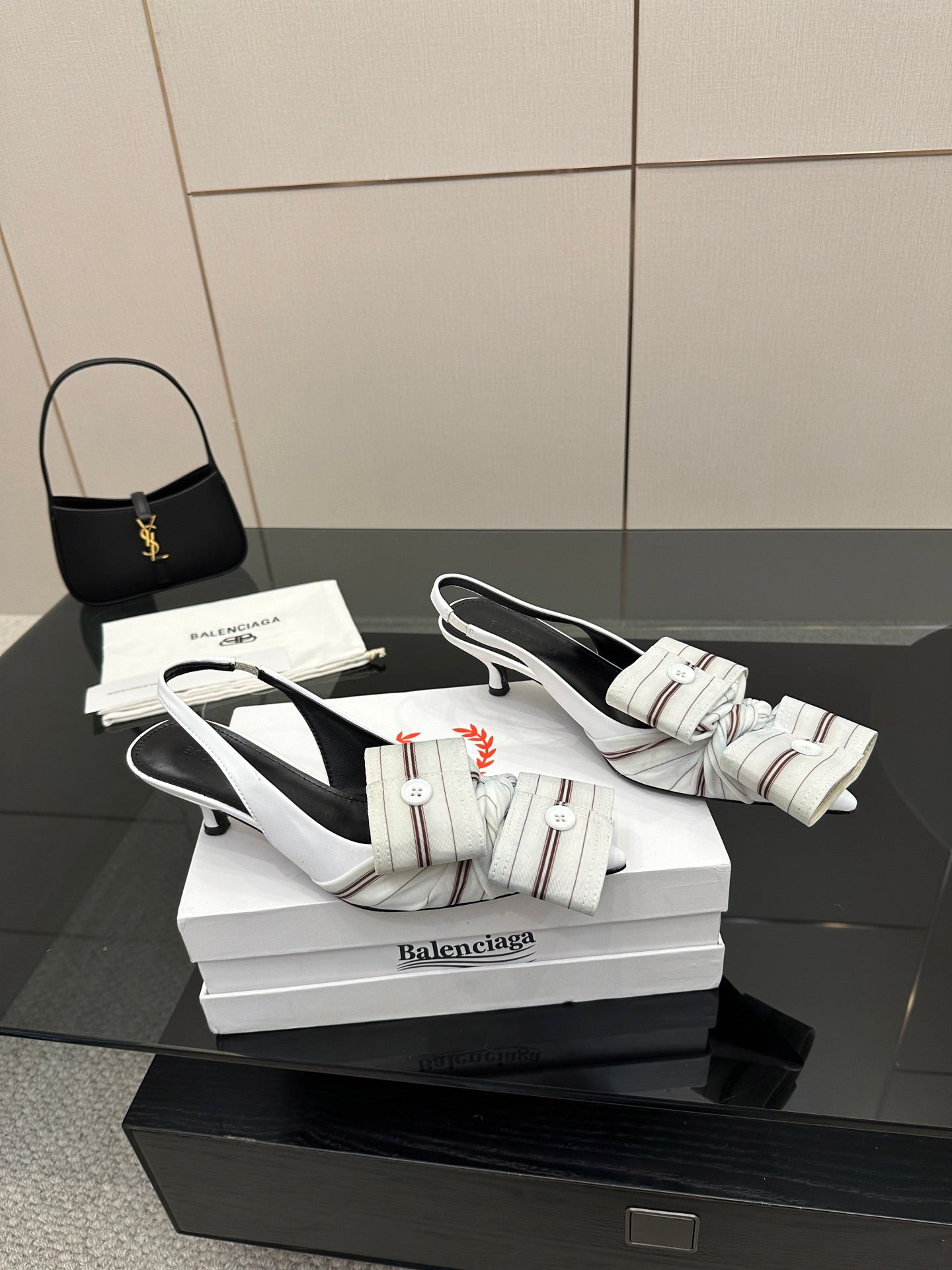 White Balenciaga women's heeled slingback sandals with buckle ankle strap